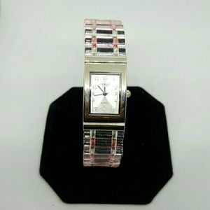 Bracelet watch with pink and white plastic rods